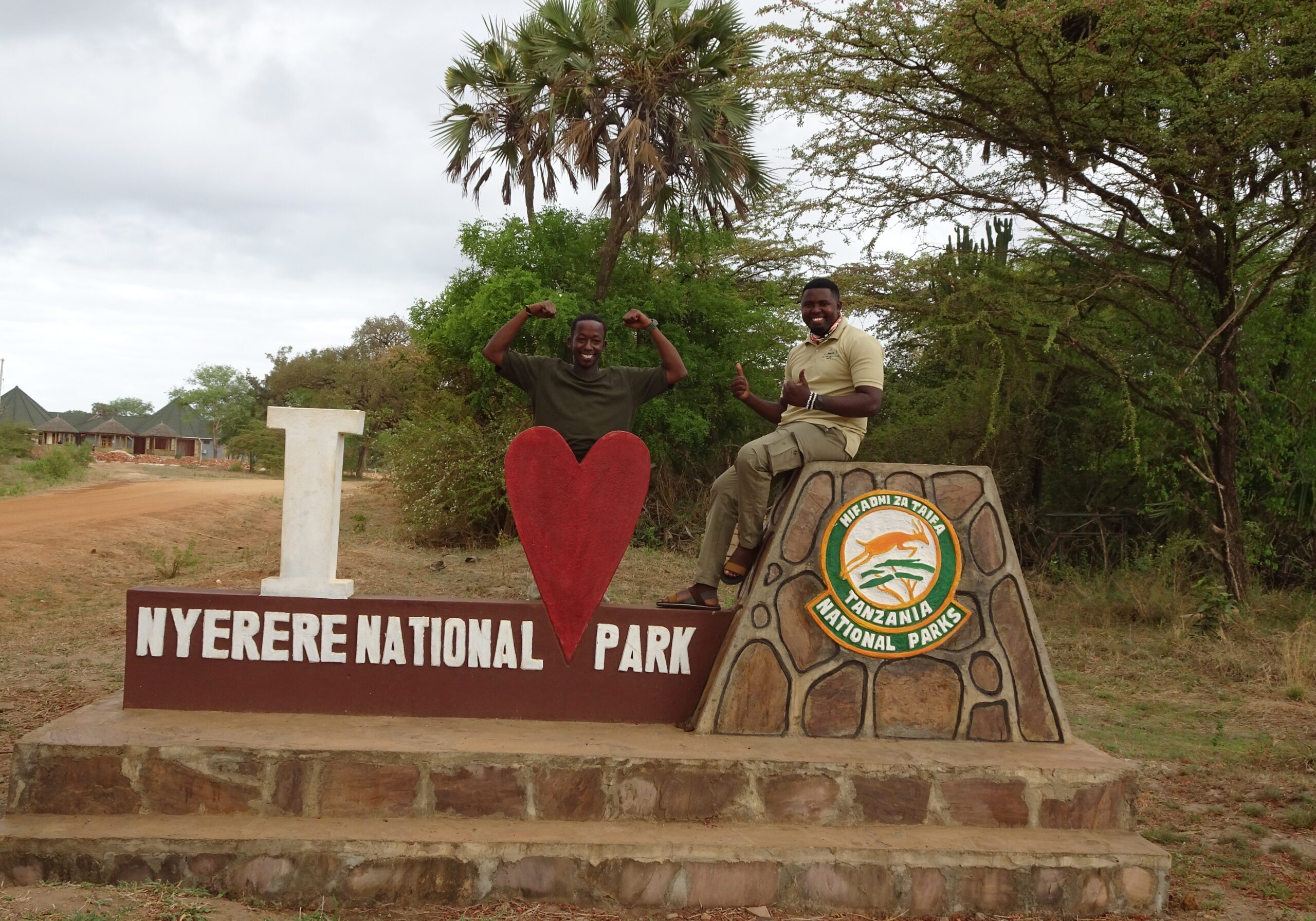 Two people posing at Nyerere National Park.