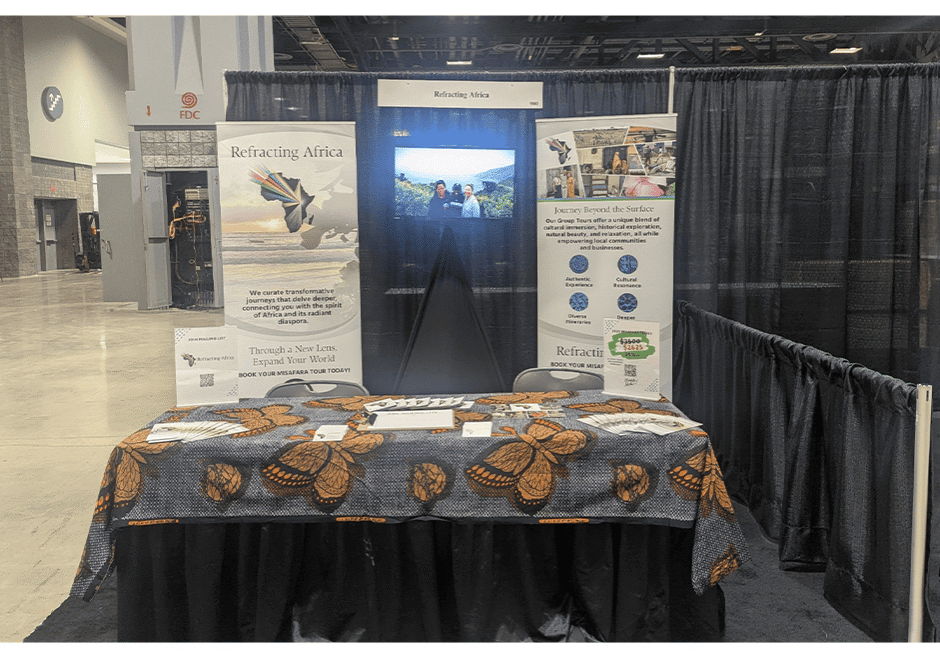Exhibition booth with informational display and brochures.